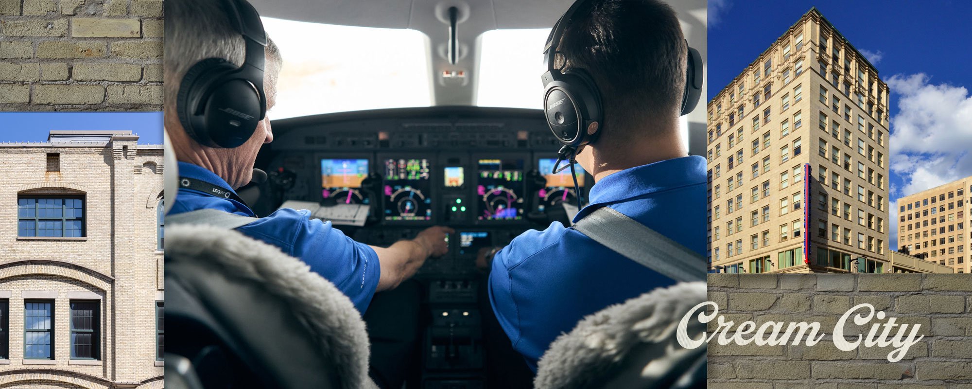 Two pilots in a private jet cockpit alongside cream brick Milwaukee buildings, with the words 